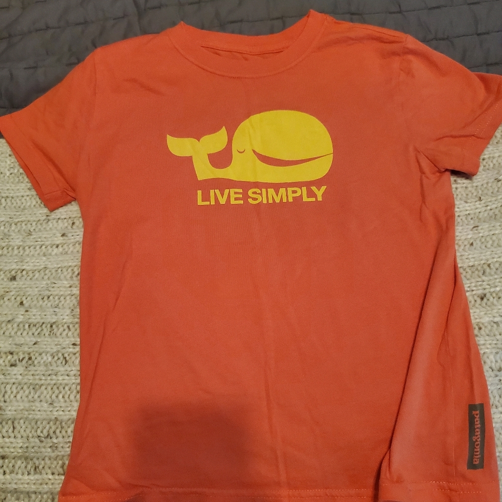 Patqgonia orange ss tshirt. Excellent condition. Kids large. Fits woman xs